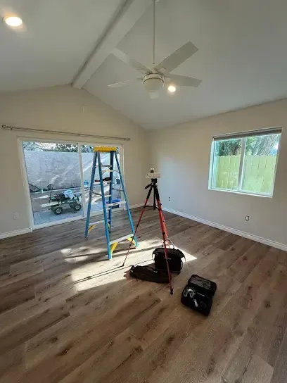 An emptied room set up with drying equipment after a water loss